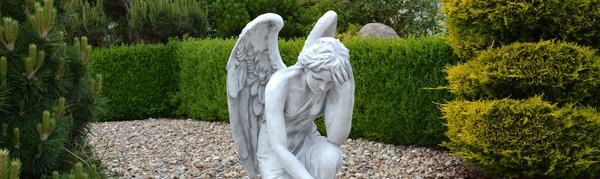 Angel statue on base