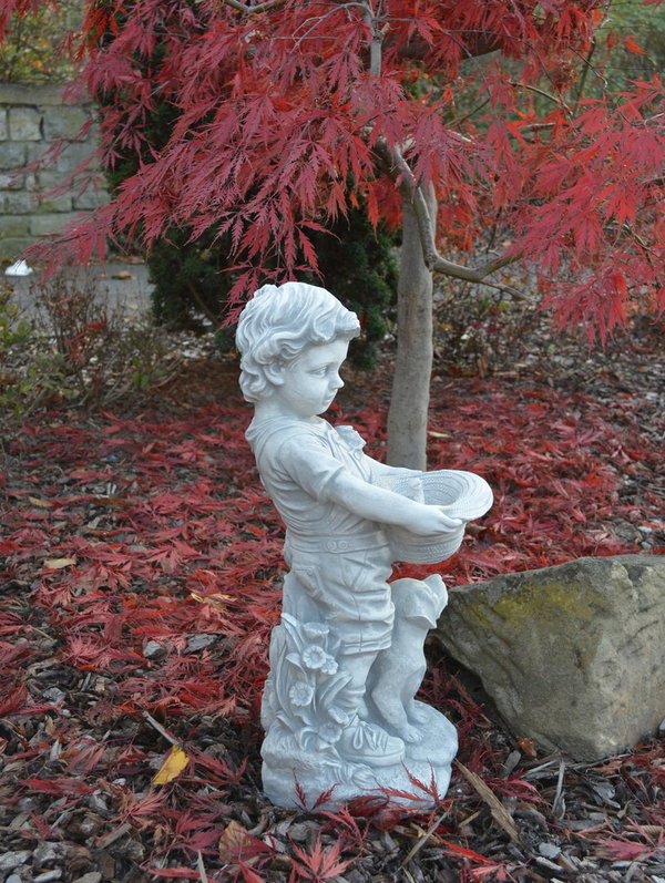 Boy figure with a hat that can be planted