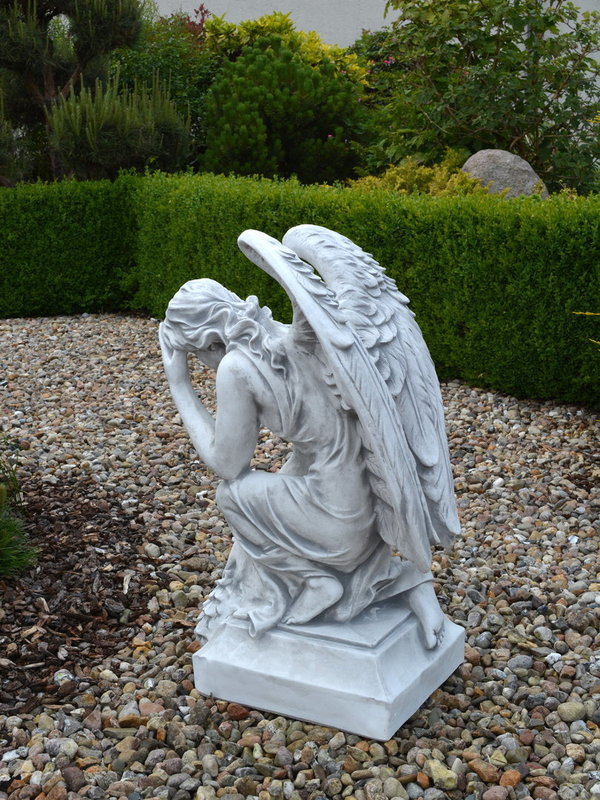 Large angel statue on base