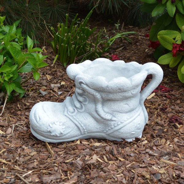 Schuh serves as an unusual herb pot
