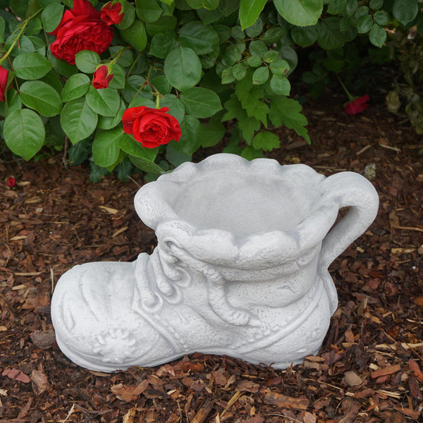 Schuh serves as an unusual herb pot